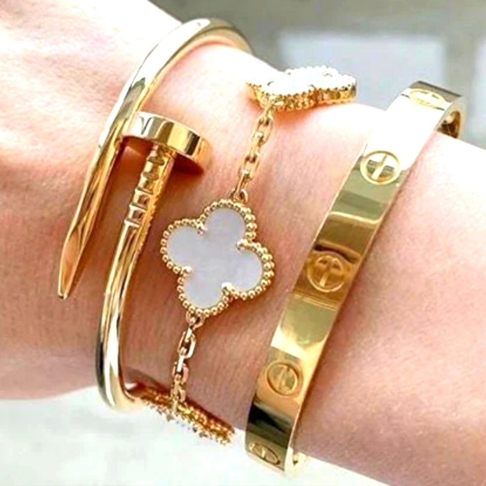 2 bracelet stack. Clover and nail.